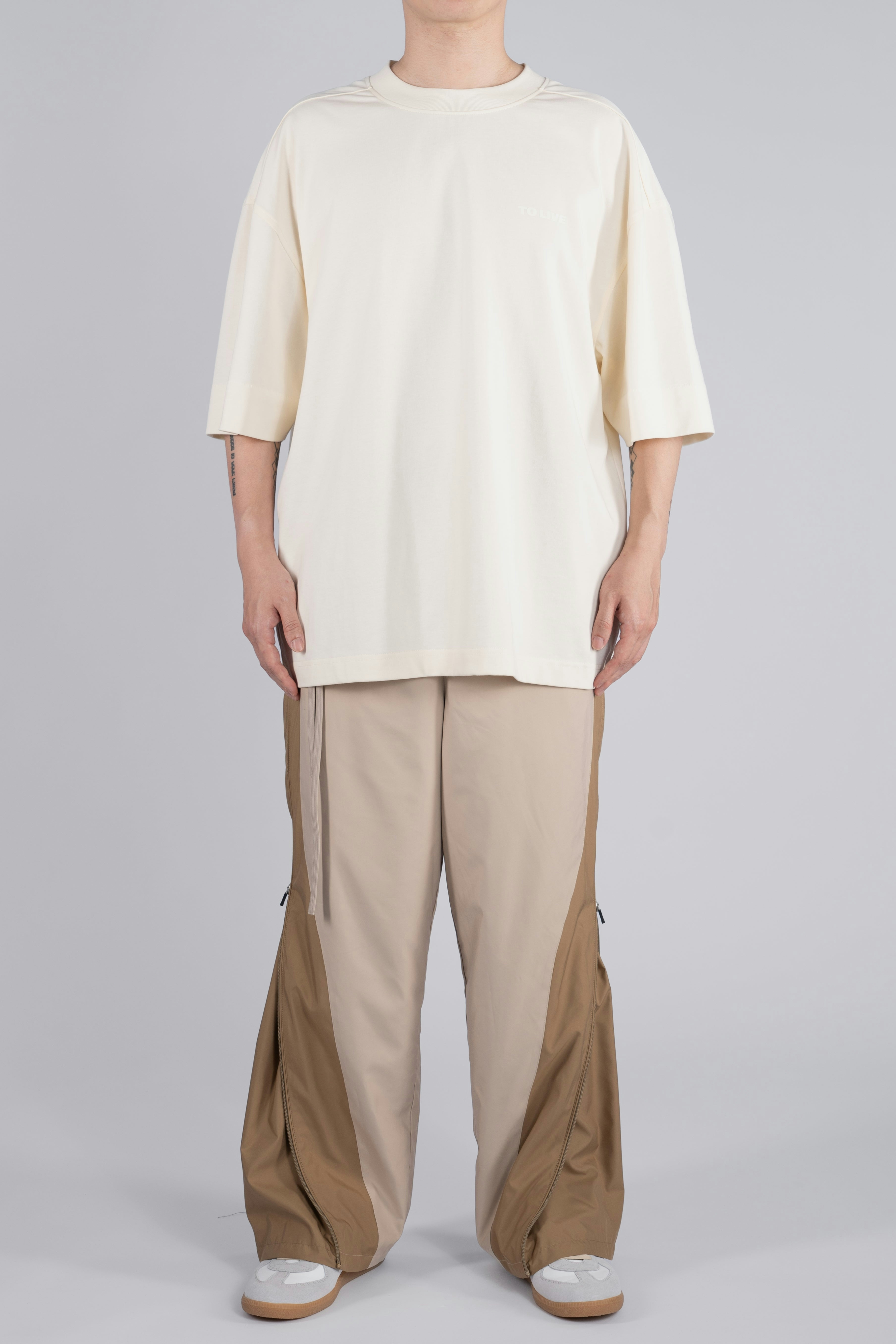 “REAL NORMALITY” Panelled Track Pants - Beige/ Khaki