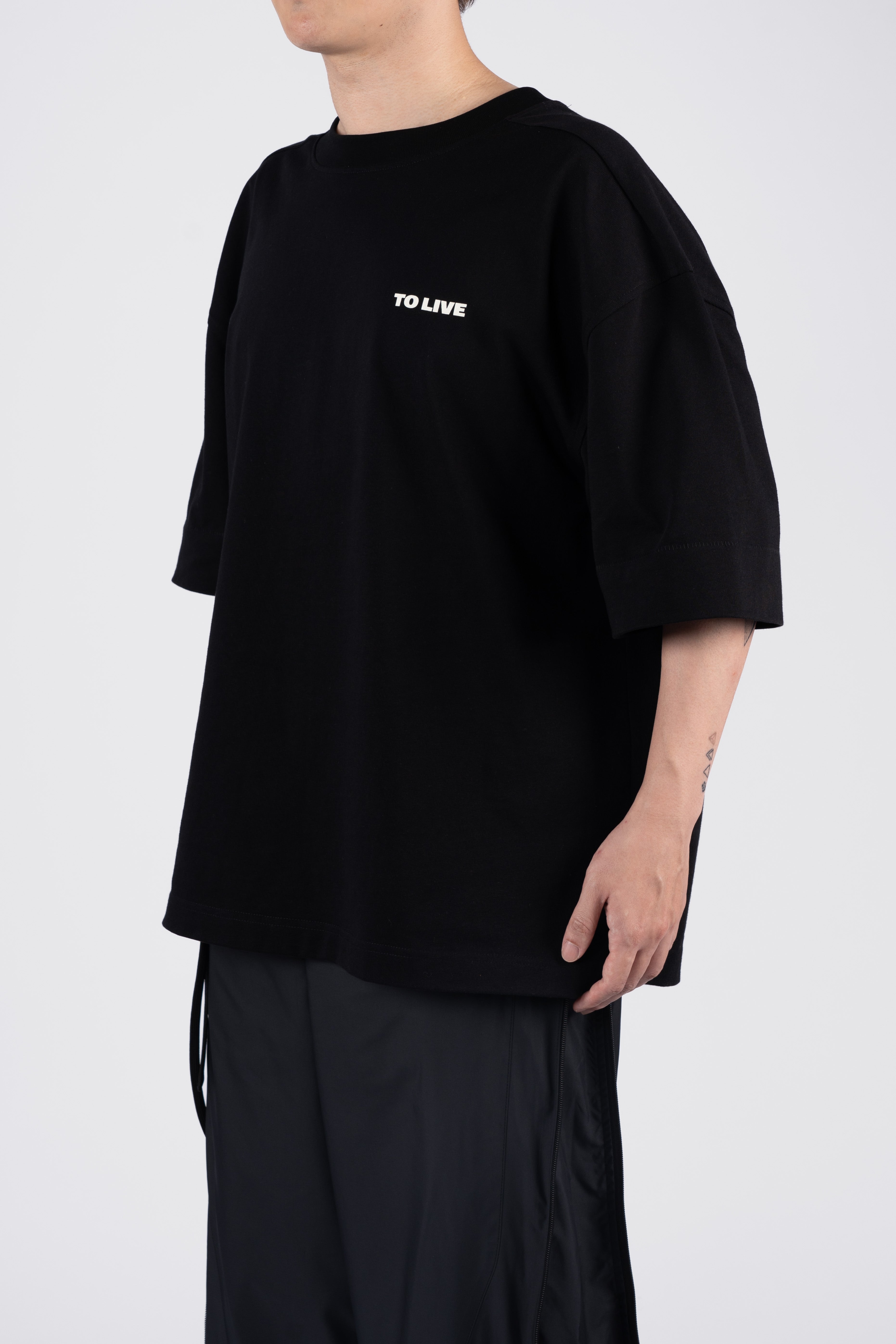 “BE REALISTIC” Statement Oversized T-Shirt - Black