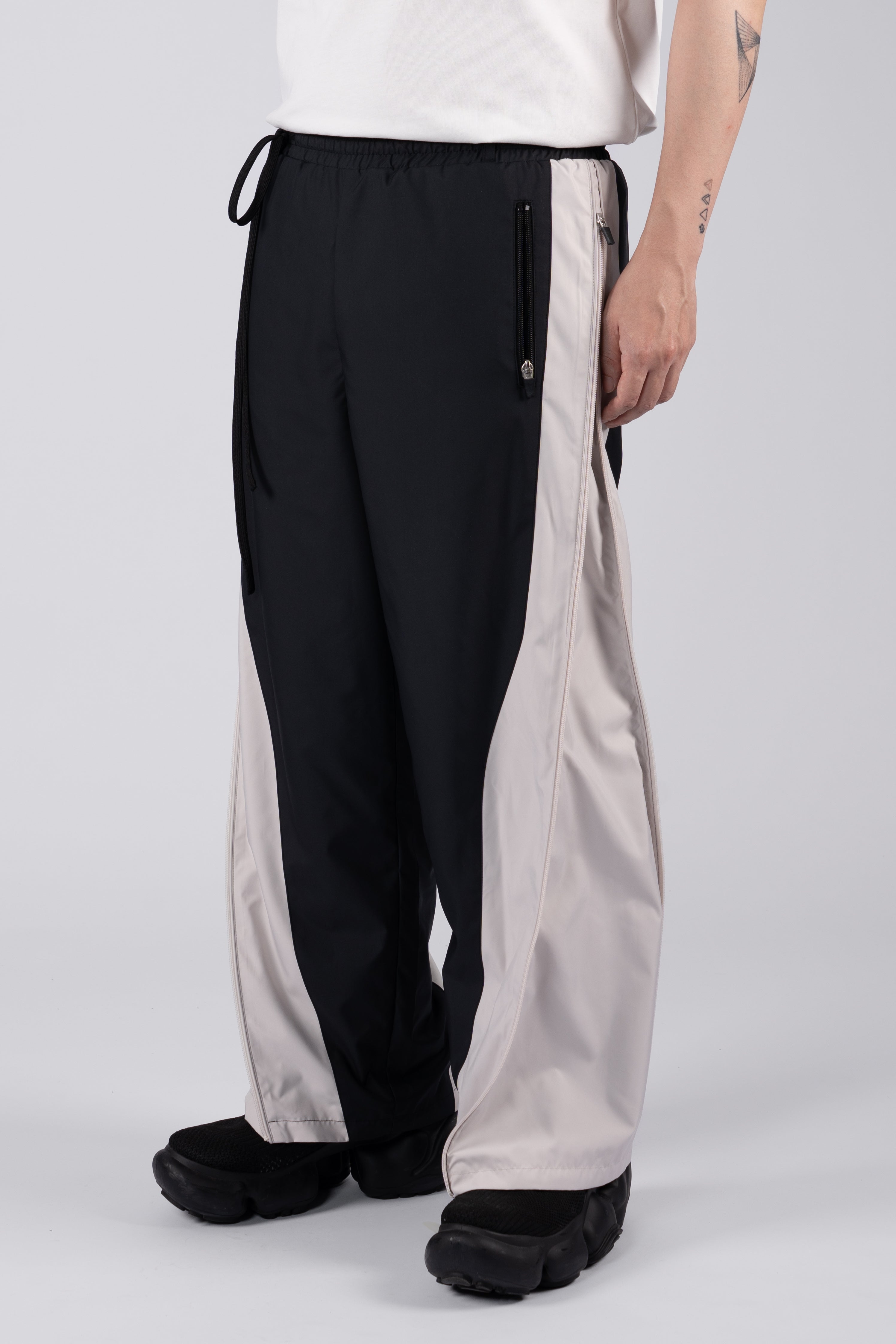 “REAL NORMALITY” Panelled Track Pants - Black/Off White