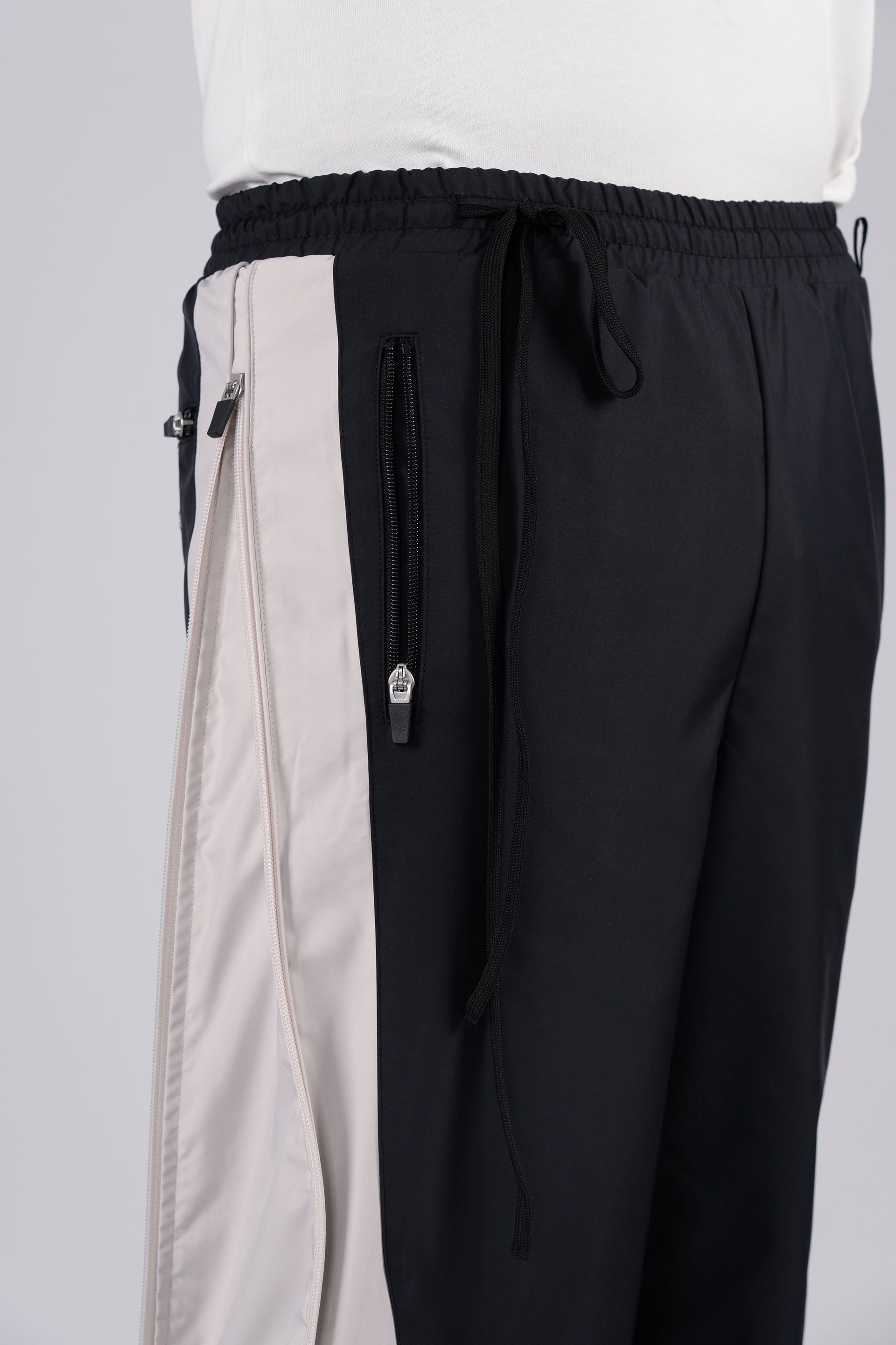 “REAL NORMALITY” Panelled Track Pants - Black/Off White