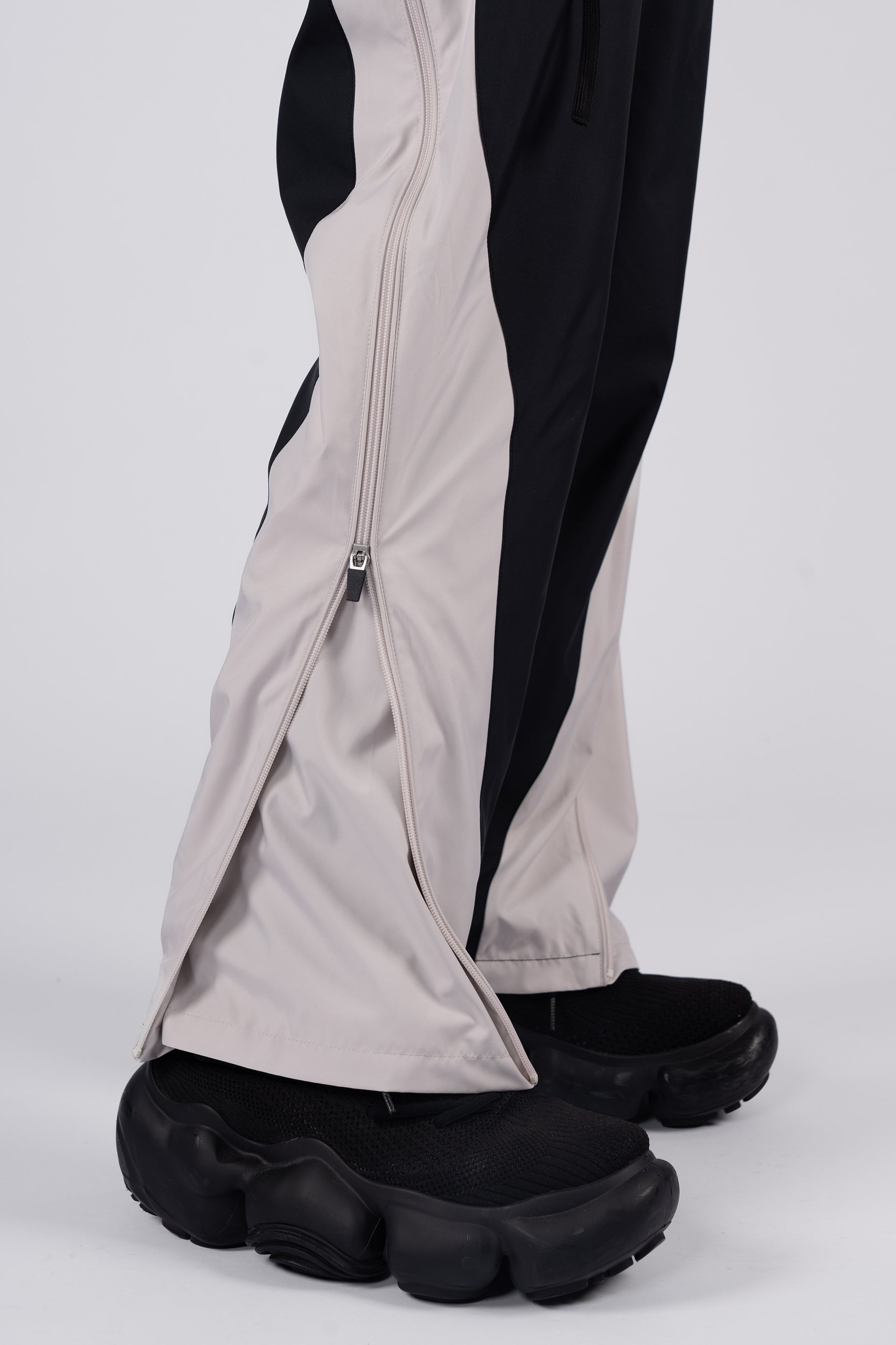 “REAL NORMALITY” Panelled Track Pants - Black/Off White