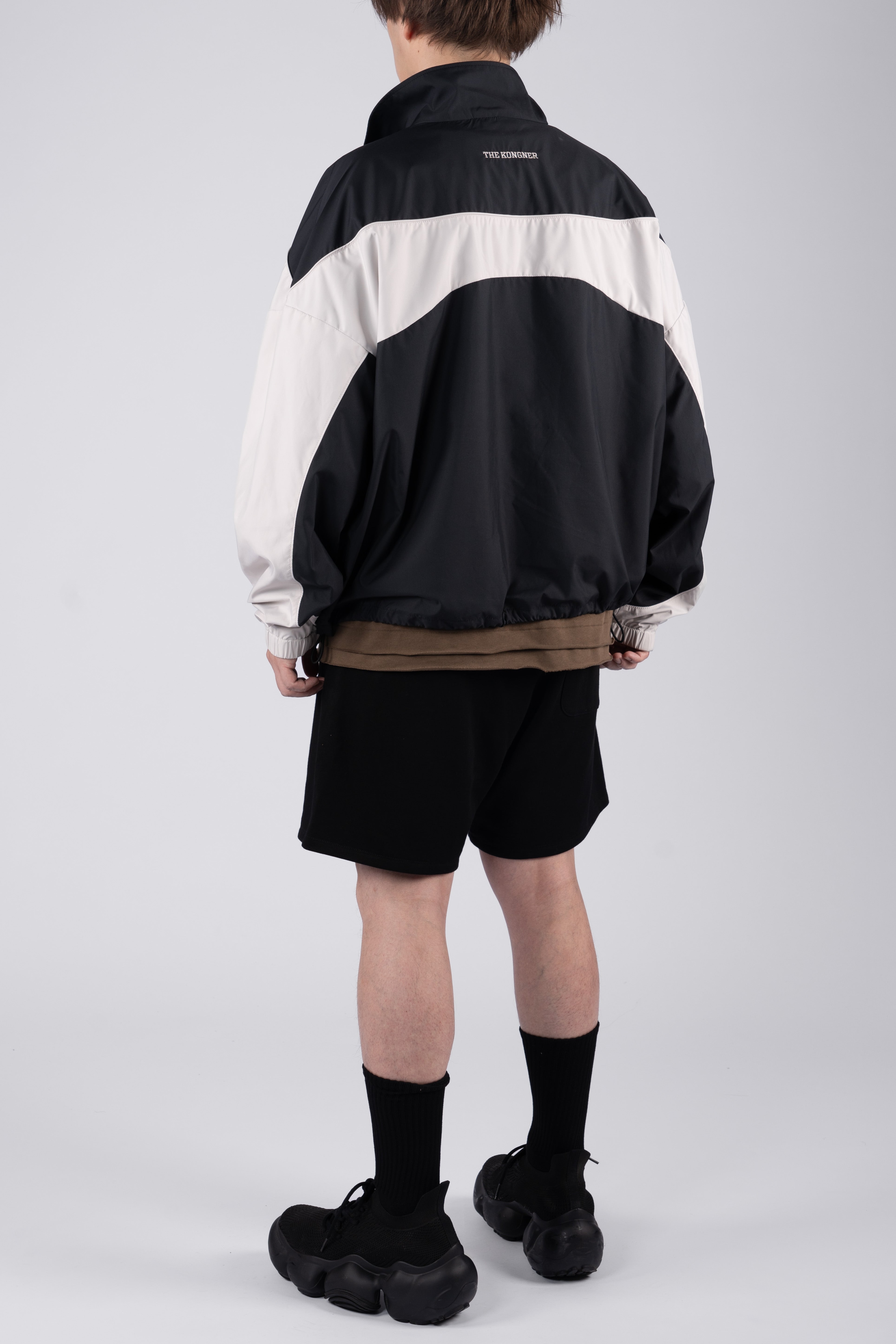 “REAL NORMALITY” Panelled Track Jacket - Black/Off White