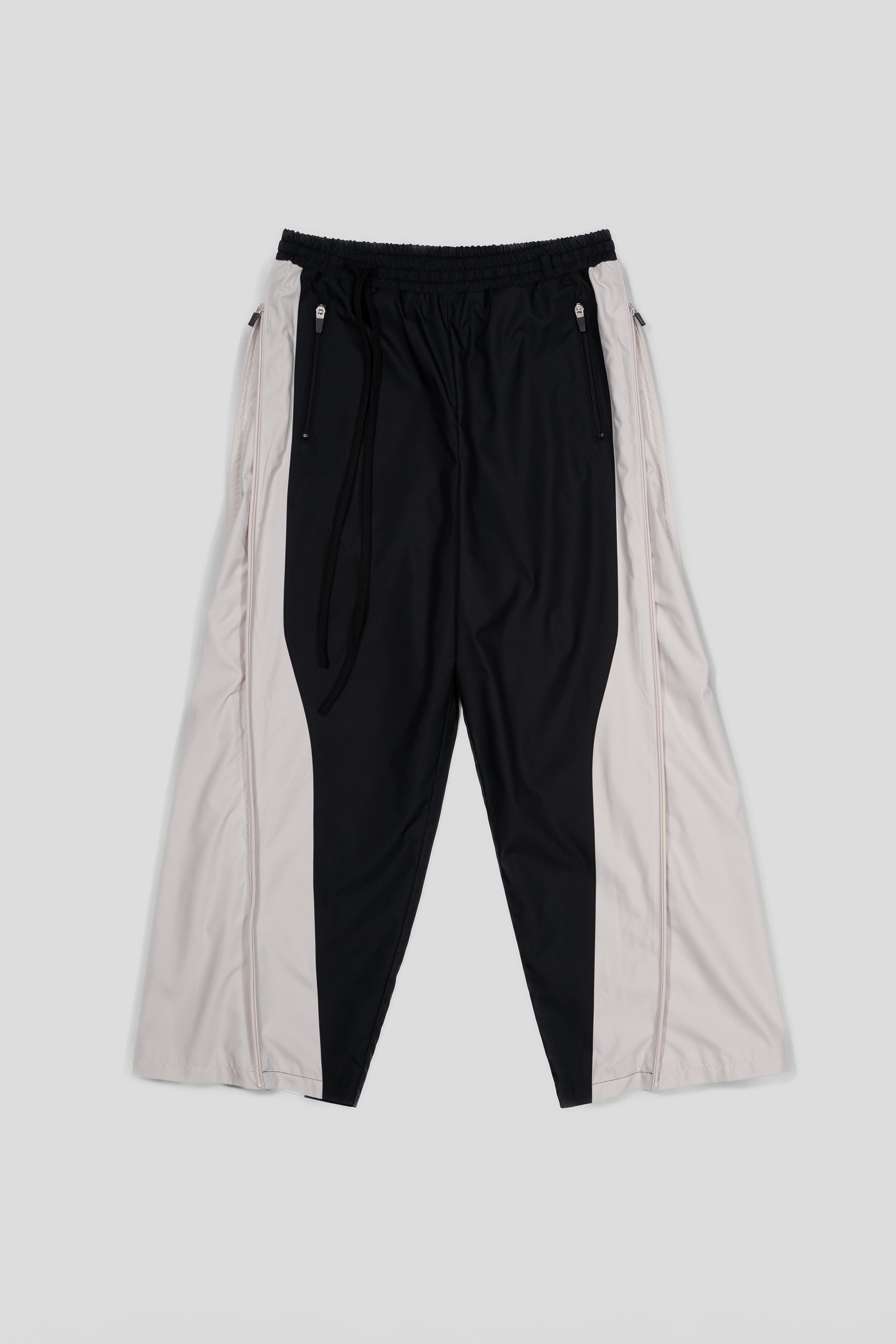 “REAL NORMALITY” Panelled Track Pants - Black/Off White