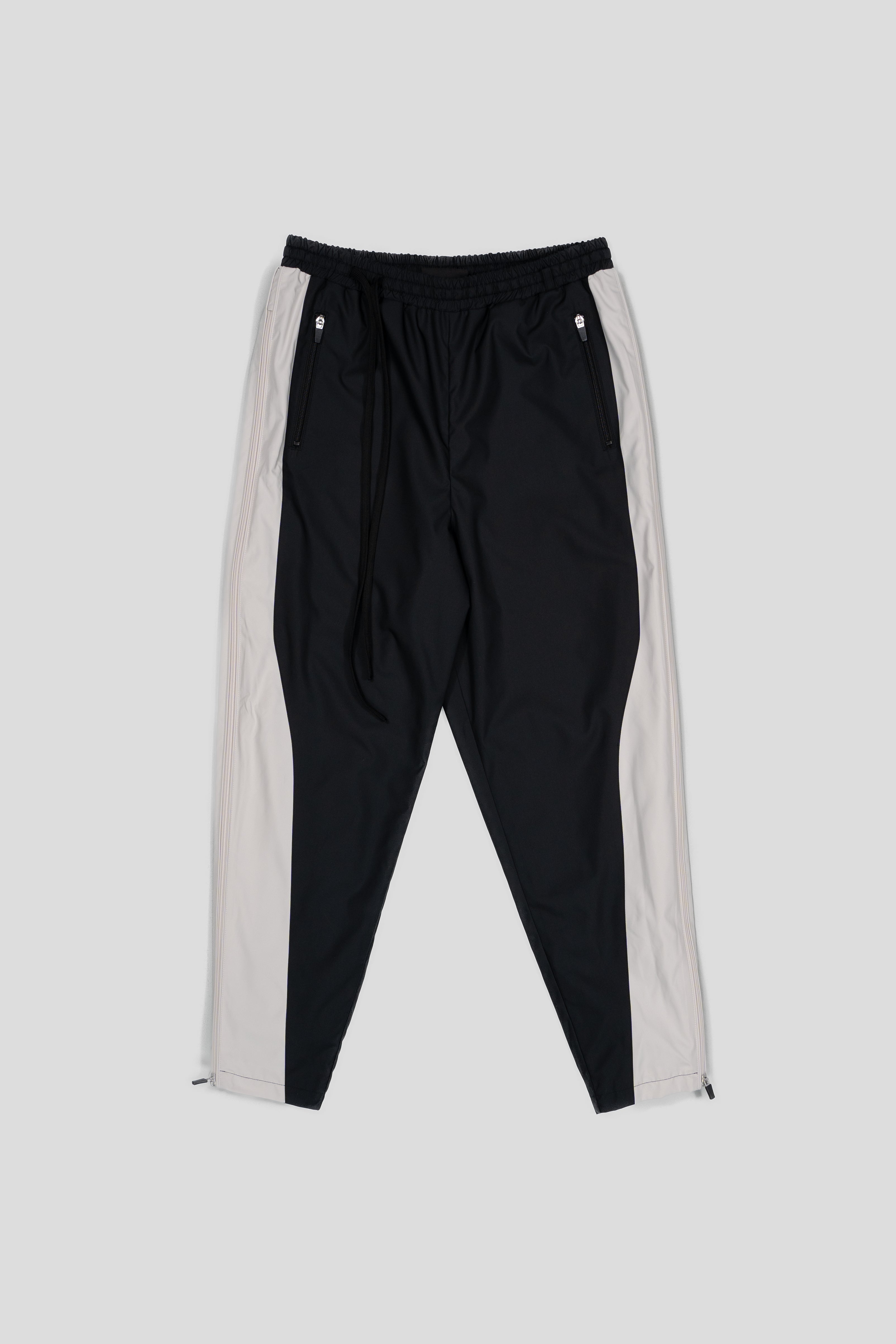 “REAL NORMALITY” Panelled Track Pants - Black/Off White