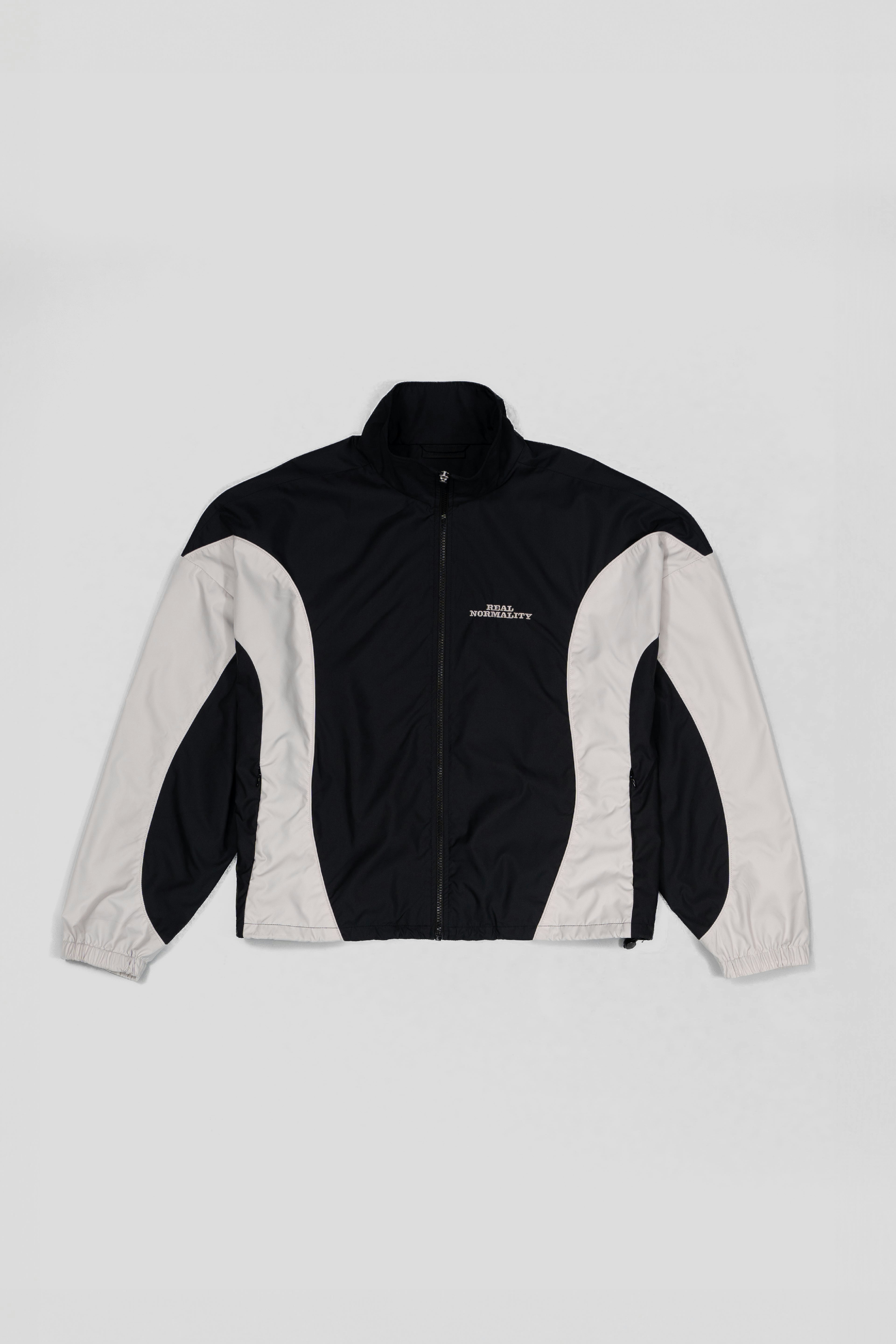 “REAL NORMALITY” Panelled Track Jacket - Black/Off White