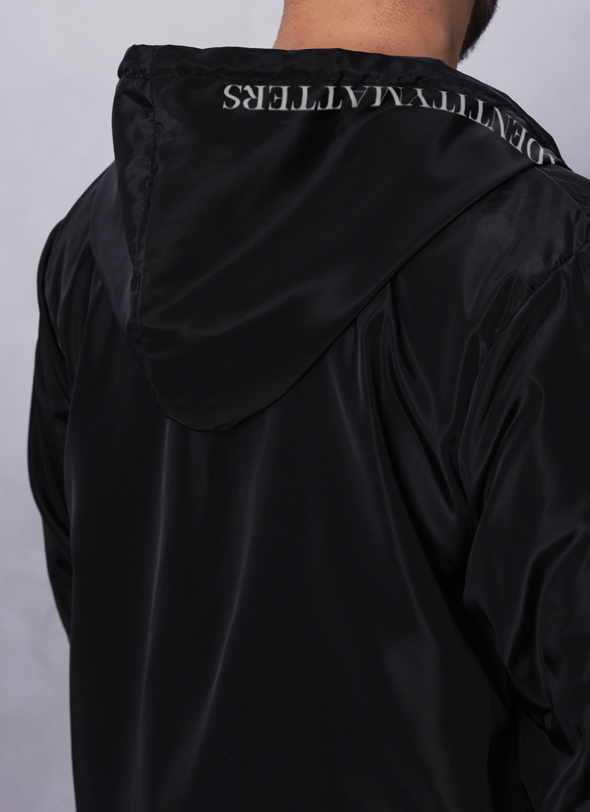 IDENTITY BREAKER Drawstring Hooded Raincoat